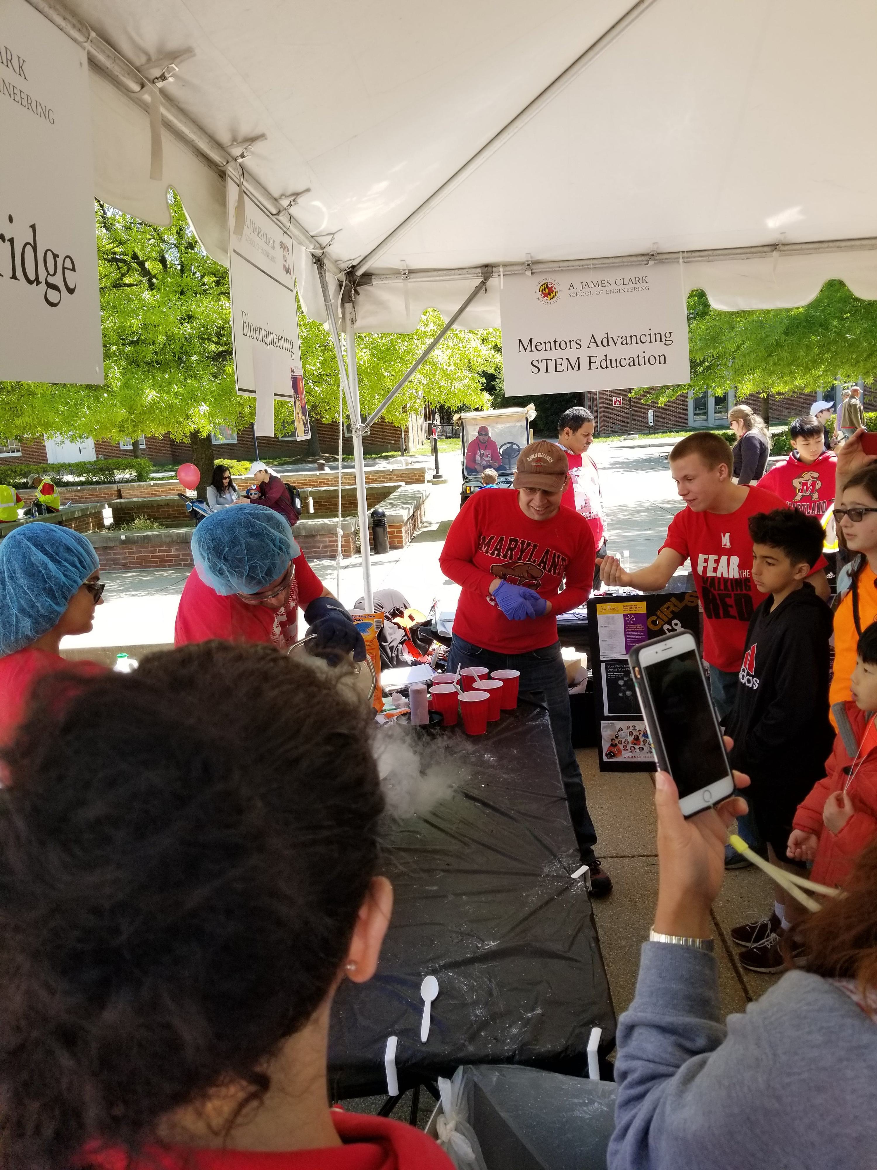 Dr. Chris Jewell (center) demonstrates lyophilization at Maryland Day