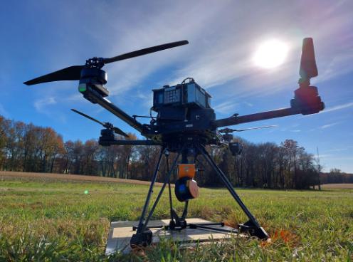 This image shows the team’s heavily modified FreeFly Alta-X drone, nicknamed "Debbie," which is equipped with a magnetometer array, FLIR camera, and LIDAR system. This advanced setup allows precise near-earth mapping of buried steam and condensate return utility pipes on campus.